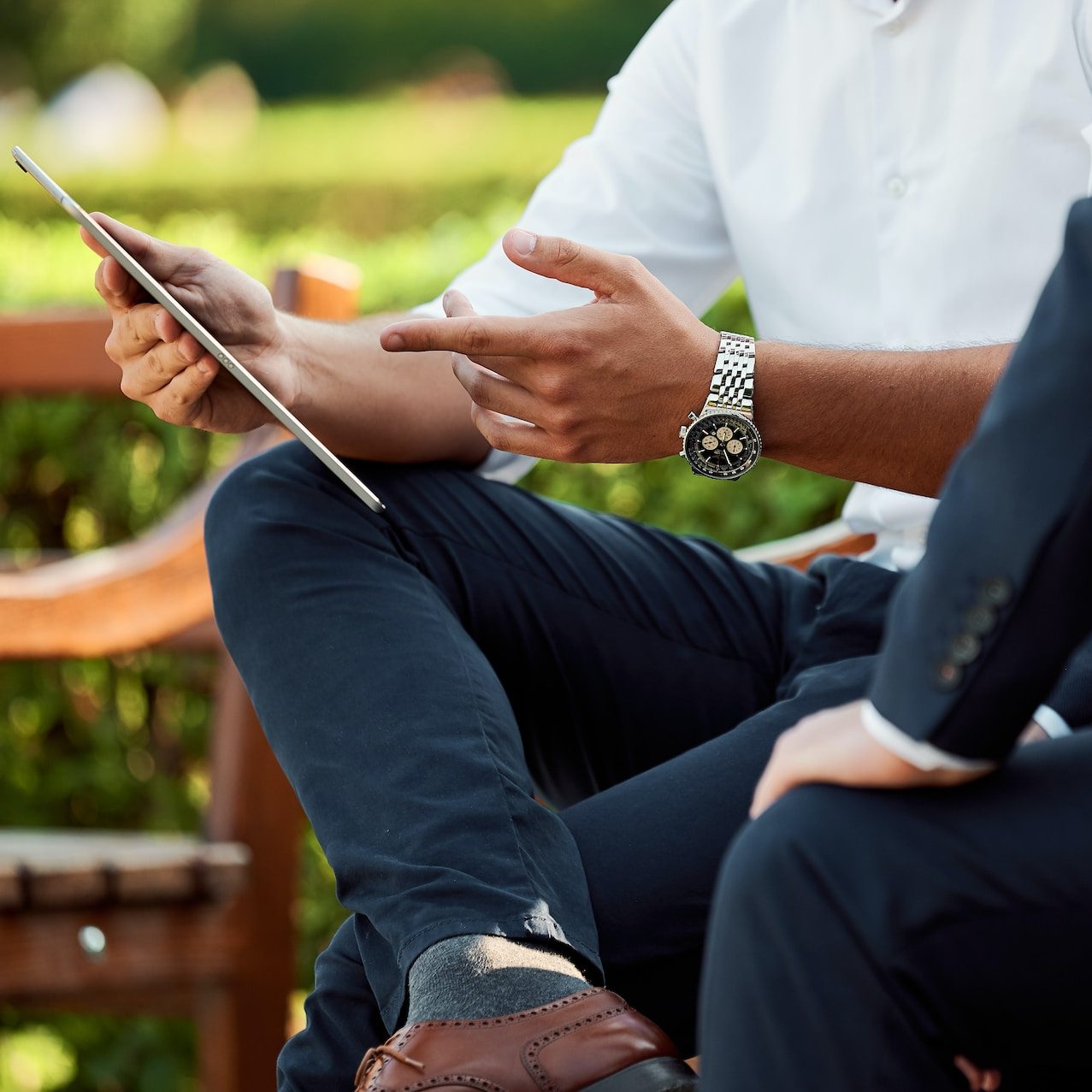 two people sitting during day